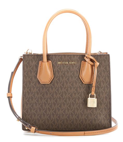 michael kors gold purse mercer|Michael Kors cross over bag.